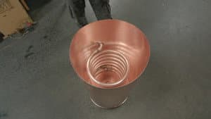 Peaked Caps, Custom Water Heaters, Electric Boats, Fencing Foils