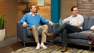 Ed Helms Wears a Grey Shirt & Brown Boots