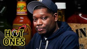 Michael Che Gs Up While Eating Spicy Wings