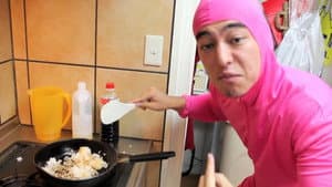 PINK GUY COOKS FRIED RICE AND RAPS