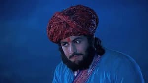 An officer imprisons Jalal